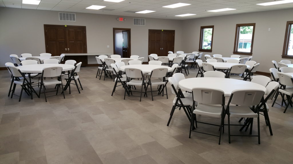 Fellowship hall w/ round tables Columbia City Church of the Brethren